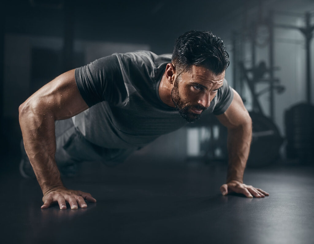 Mediterranean Male Intense Pushup GYM Workout Wallpaper